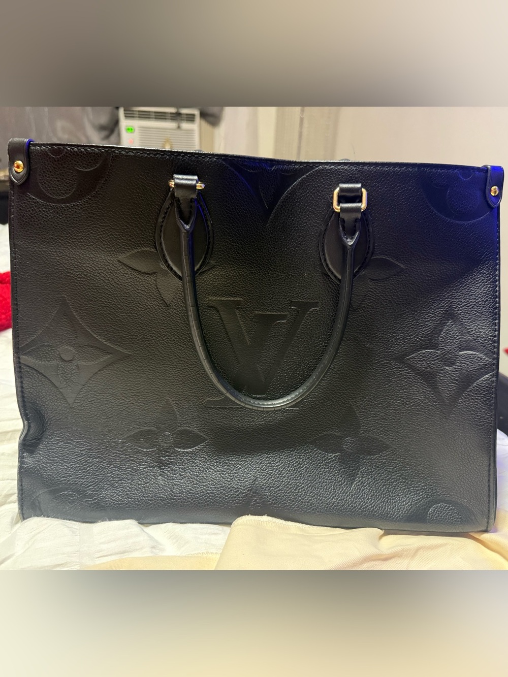 Black leather tote bag